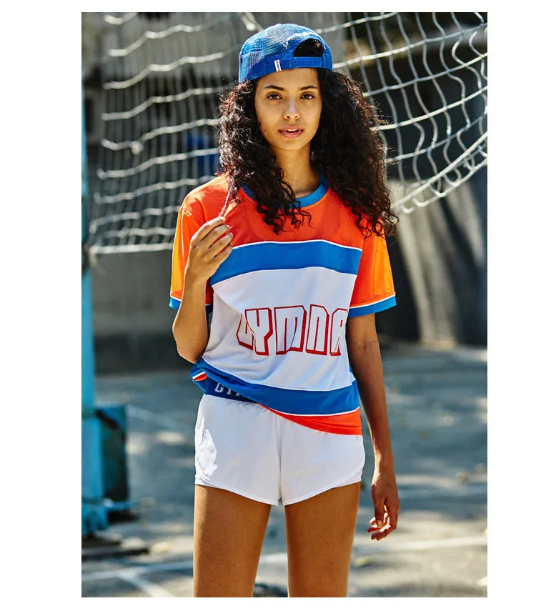 GYMNA TRAINING SHORT SLEEVE MESH TOP IN BLUE STRIPE