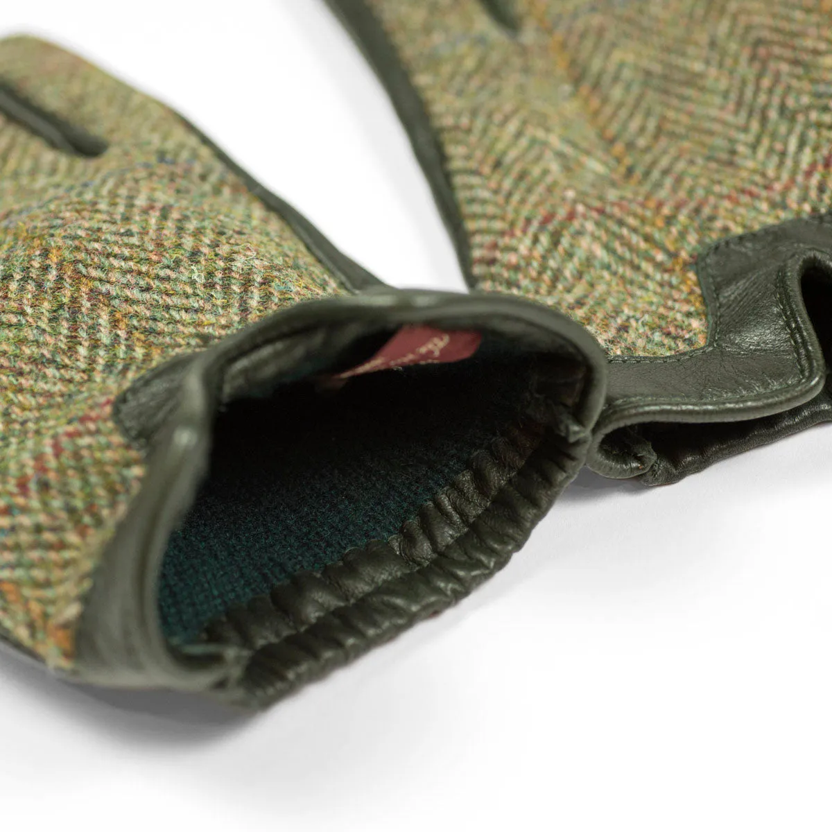 Hunter green cashmere-lined gloves with Harris Tweed herringbone back